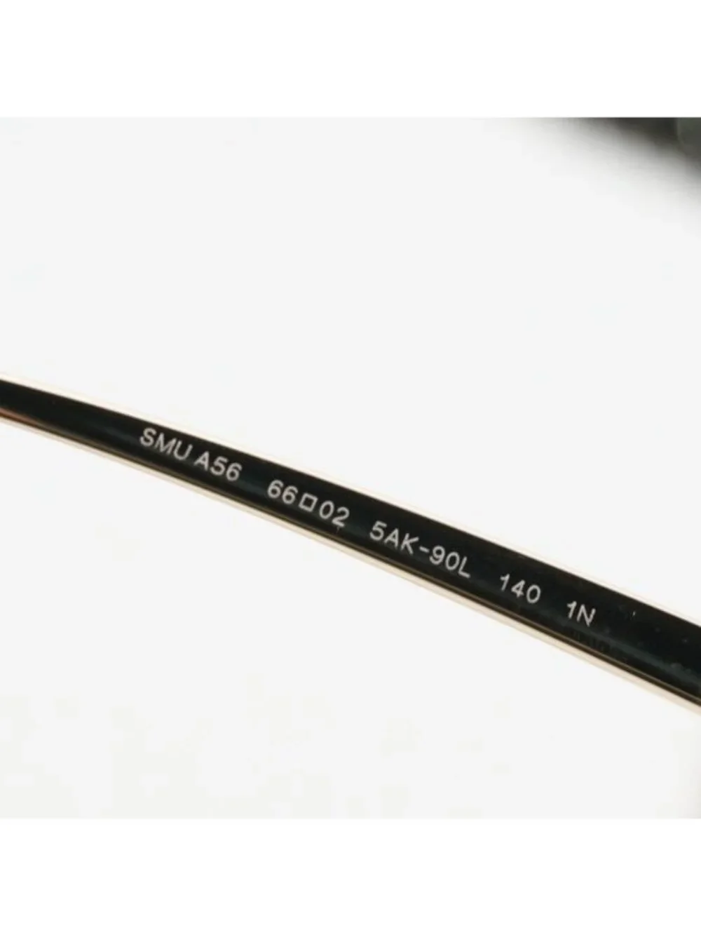 Miu Miu MUA56S 5AK90L Sunglasses Gold Geometric Frame, Brown Lenses